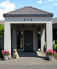 Front of Sprick Roofing office with dog Ruby