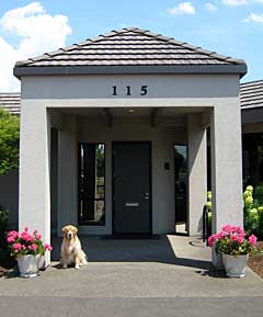 Front of Sprick Roofing office with dog Ruby